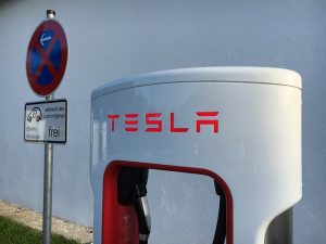 Image is a Tesla charging station in a different country.